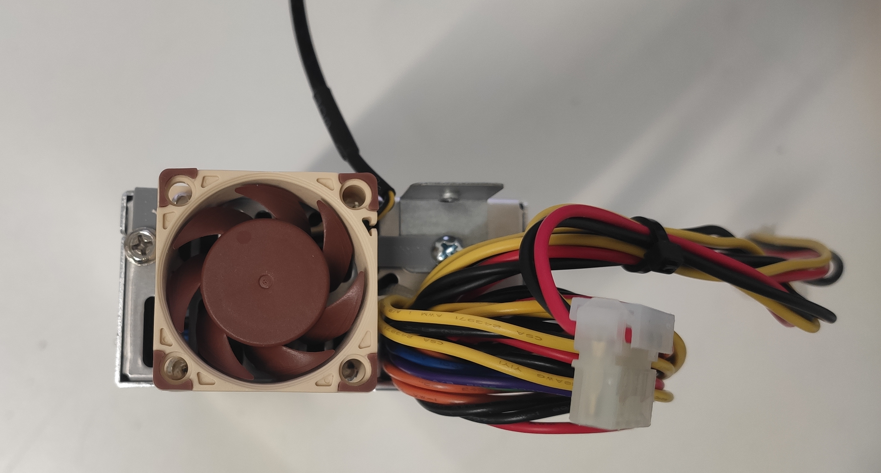 Fan mounted to outside of PSU